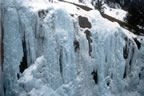 Alan climbing WI4 in the Scottish Gullies in 2000 (54kb)